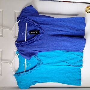 One blue and one aqua ruffled fitted cotton t-shirts.